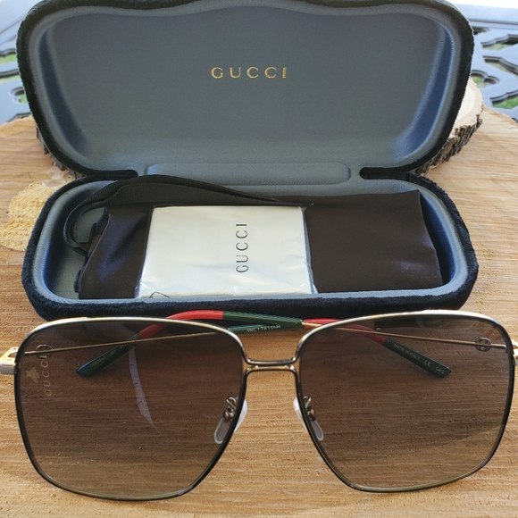 Gucci Accessories - NWT Gucci GG0394S sunglasses black with gold